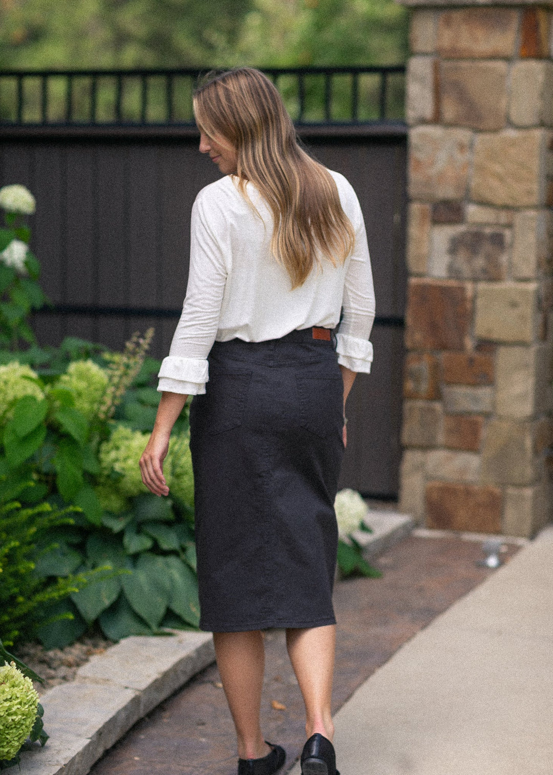 Remi Onyx Black Denim Midi Skirt detail view