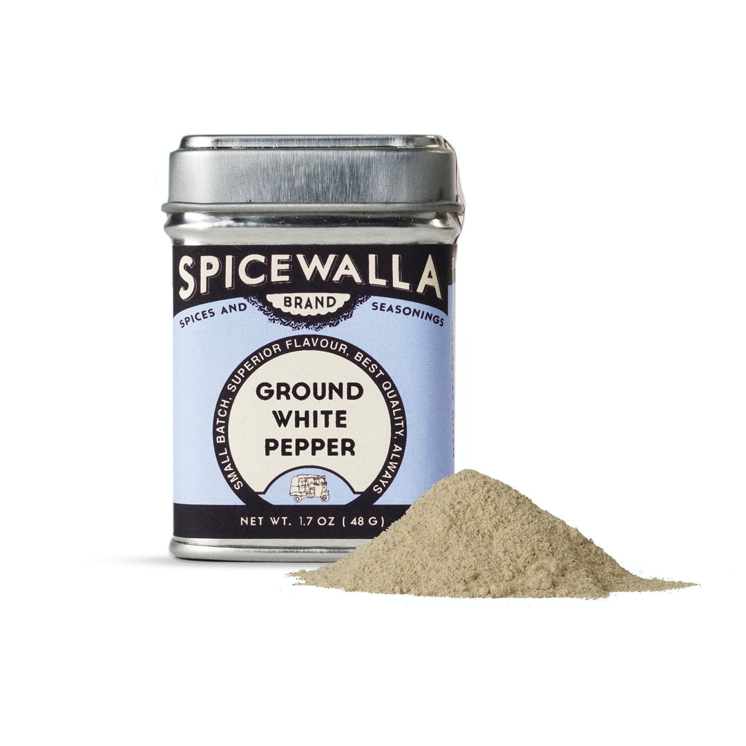 Ground white pepper spice in small tin for cooking